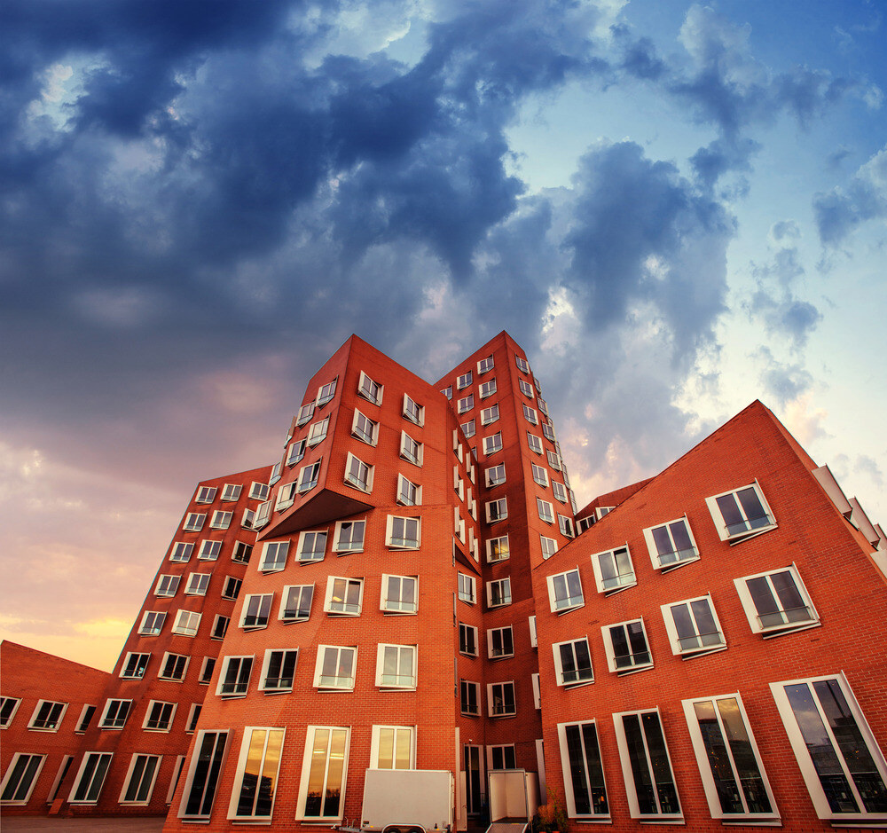 the-new-block-of-modern-flats-and-blue-sky-2023-11-27-04-50-22-utc (1)